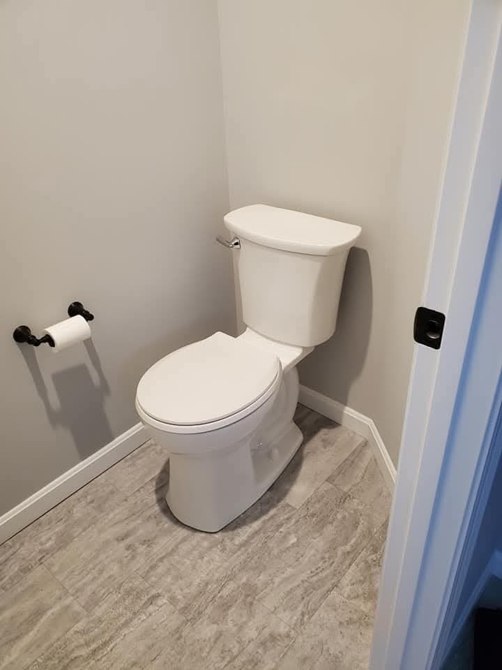 Toilet install, bronze accents